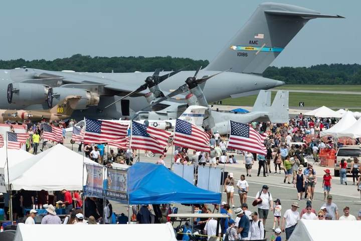 Crowds, vendor tents and aircraft at the Thunder Over Dover air show